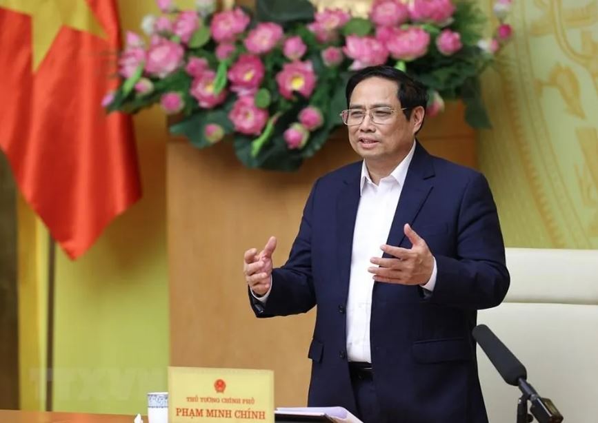 Thủ tướng Phạm Minh Chính chúc mừng các cơ quan báo chí nhân Ngày Báo chí cách mạng Việt Nam. (Ảnh: Dương Giang/TTXVN)