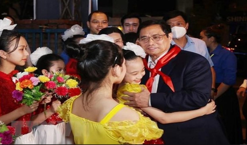 Thủ tướng Phạm Minh Chính đến dự Lễ phát động Tháng hành động vì trẻ em và khai mạc Hè năm 2022. (Ảnh: Dương Giang/TTXVN)