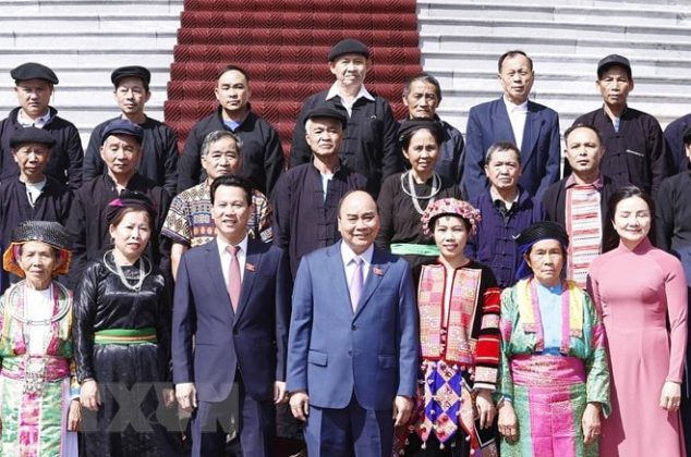 Chủ tịch nước Nguyễn Xuân Phúc gặp mặt đoàn đại biểu người có uy tín tiêu biểu tỉnh Hà Giang. (Ảnh: Thống Nhất/TTXVN)