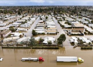 Cảnh ngập lụt sau những trận mưa lớn do ảnh hưởng của bão tại Merced, California, Mỹ, ngày 10/1/2023.