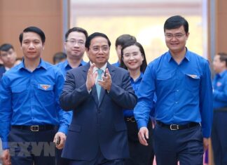 Hình ảnh Thủ tướng Phạm Minh Chính tham gia đối thoại với thanh niên
