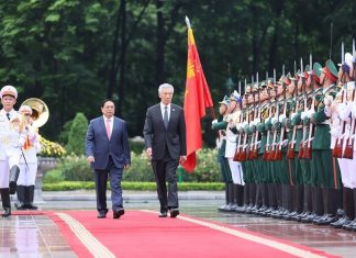 Thủ tướng Phạm Minh Chính chủ trì lễ đón Thủ tướng Singapore
