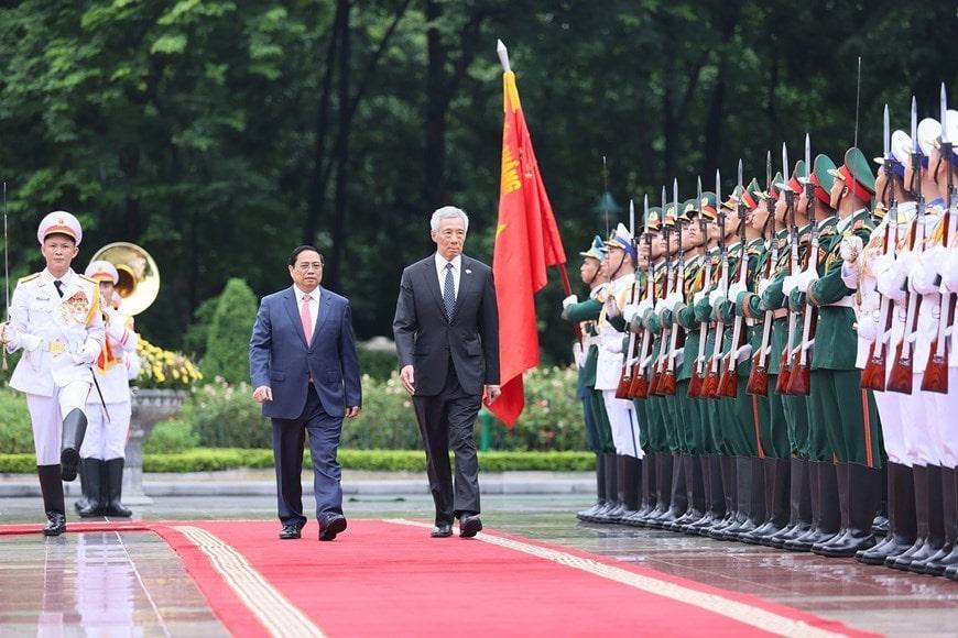 Thủ tướng Phạm Minh Chính chủ trì lễ đón Thủ tướng Singapore