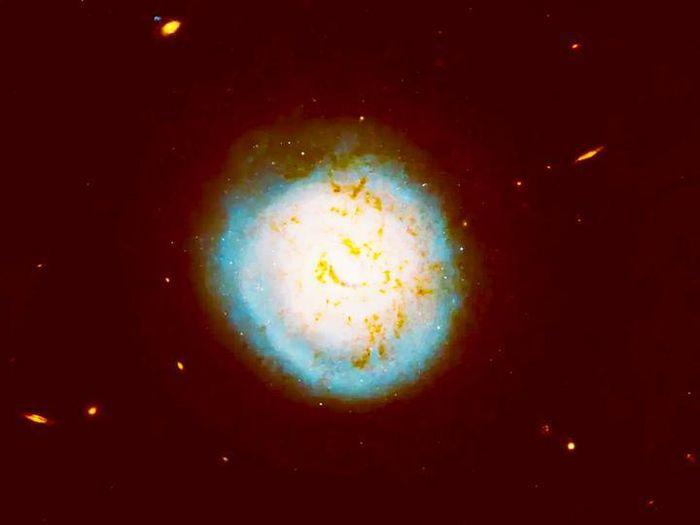 ESO 420 G013 la mot thien ha xoan oc - 'Thiên hà quả bóng chày' có trái tim lỗ đen ngoạn mục