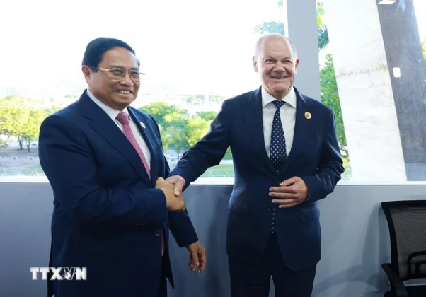 Thủ tướng Phạm Minh Ch&iacute;nh gặp Thủ tướng Đức Olaf Scholz. (Ảnh: Dương Giang/TTXVN)