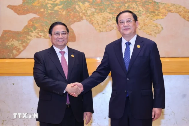 Thủ tướng L&agrave;o Sonexay Siphandone v&agrave; Thủ tướng Phạm Minh Ch&iacute;nh.