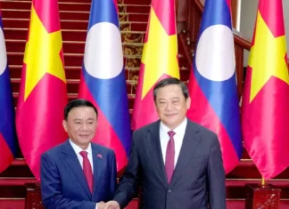 Thường trực Ban Bí thư Trần Cẩm Tú hội kiến Thủ tướng Lào Sonexay Siphandone